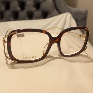 Gucci glasses , never worn does not fit my face frame NWOT,may add prescription